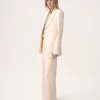 High-rise flared pants in wool gabardine