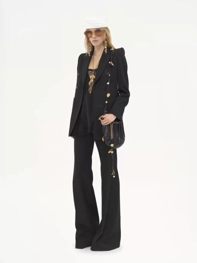 High-rise flared pants in wool grain de poudre
