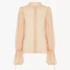 Puff-sleeve blouse in silk mousseline
