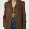 Riding coat in houndstooth wool