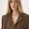 Riding coat in houndstooth wool