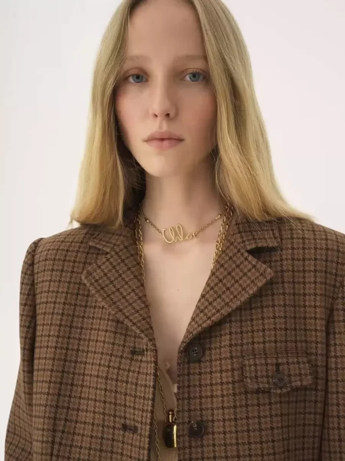 Riding coat in houndstooth wool