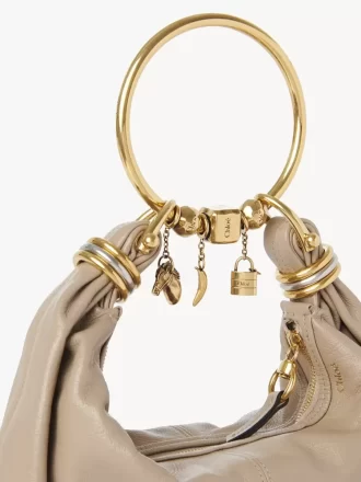 Cube Banana Dice bracelet charm in brass