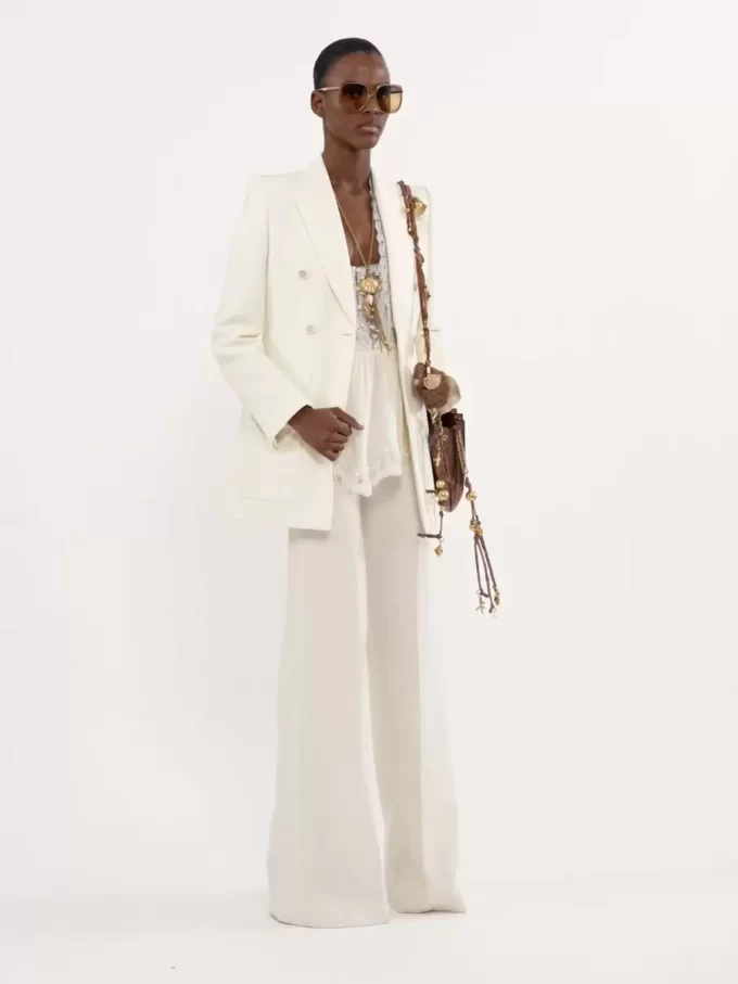 High-rise flared pants in wool grain de poudre