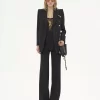 High-rise flared pants in wool grain de poudre
