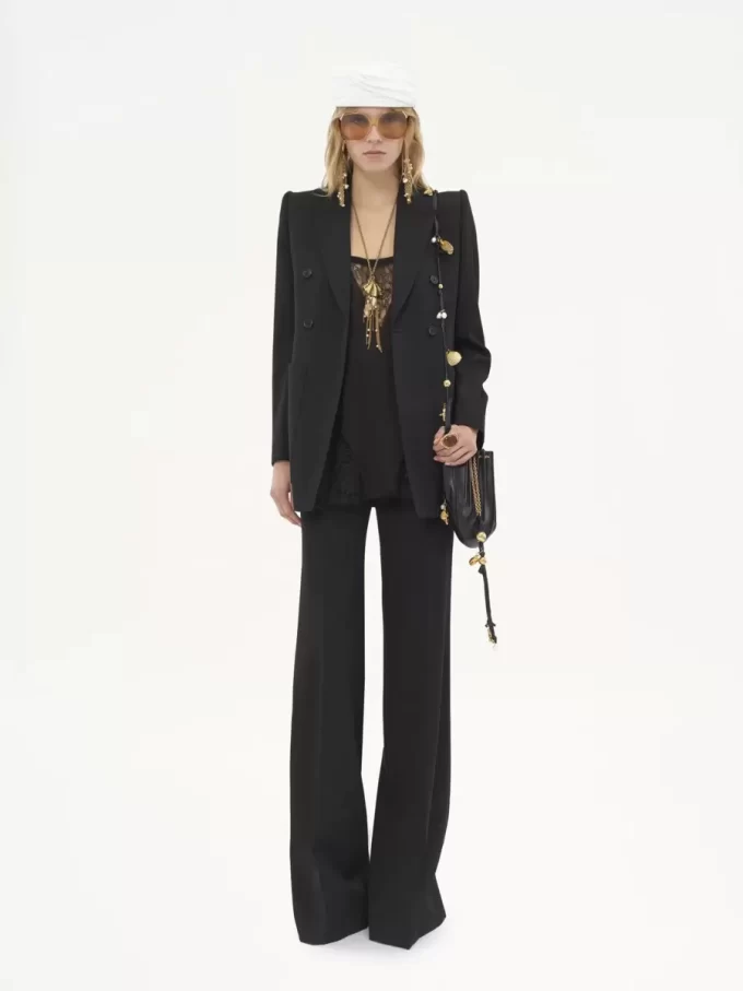High-rise flared pants in wool grain de poudre
