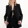 High-rise flared pants in wool grain de poudre