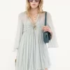 Pleated mini dress in silk mousseline