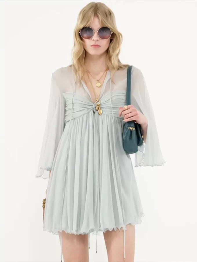 Pleated mini dress in silk mousseline