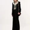 High-rise flared pants in wool grain de poudre